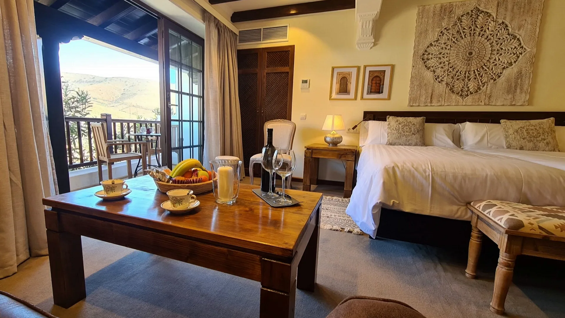 Double Room Nº 2: a table set for coffee by the open balcony door, the bed beside it